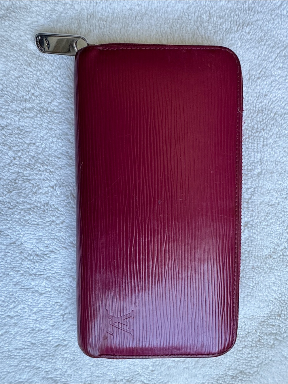 Louis Vuitton Zippy Wallet in Red Epi leather.